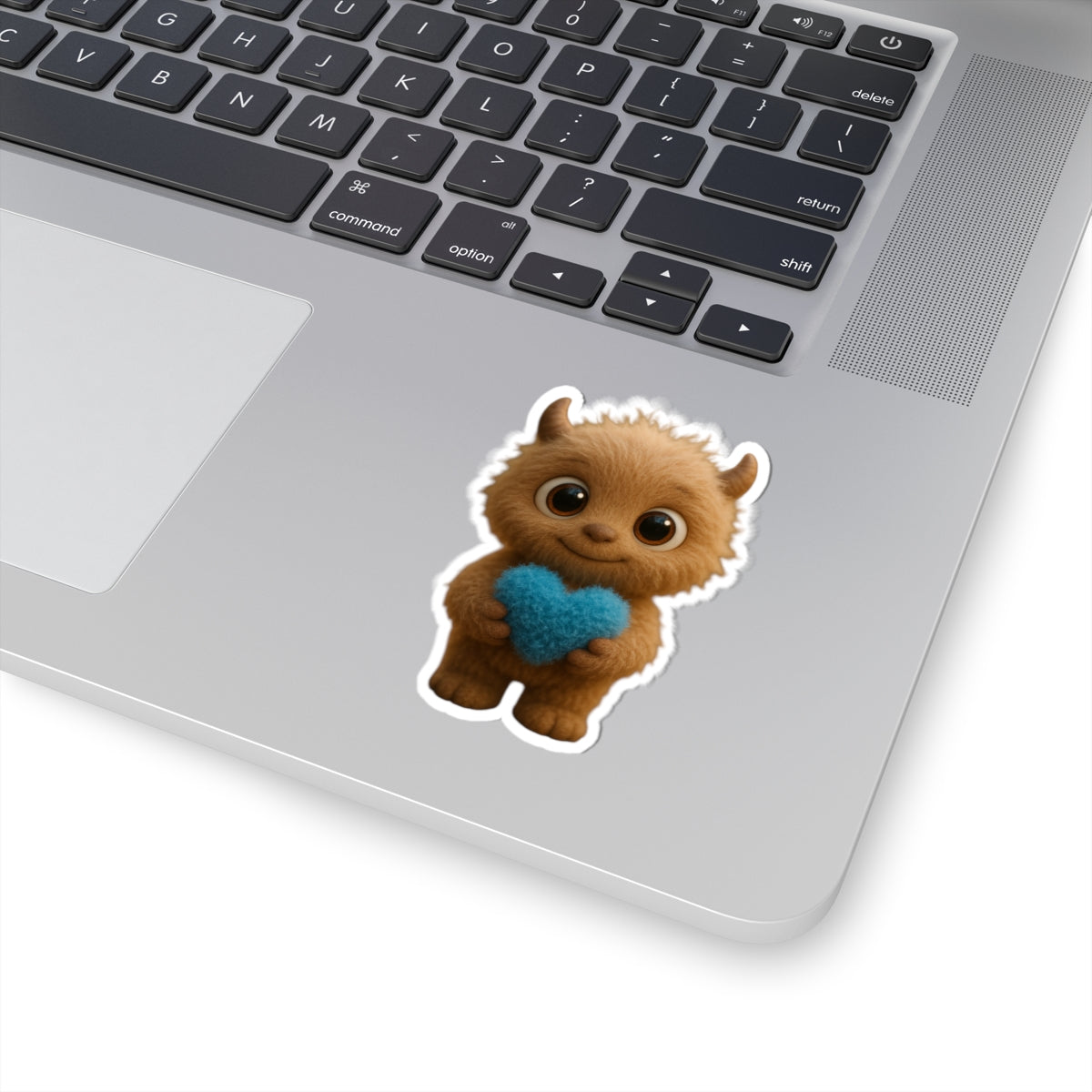 Brown Furry Monster Holding Blue Heart