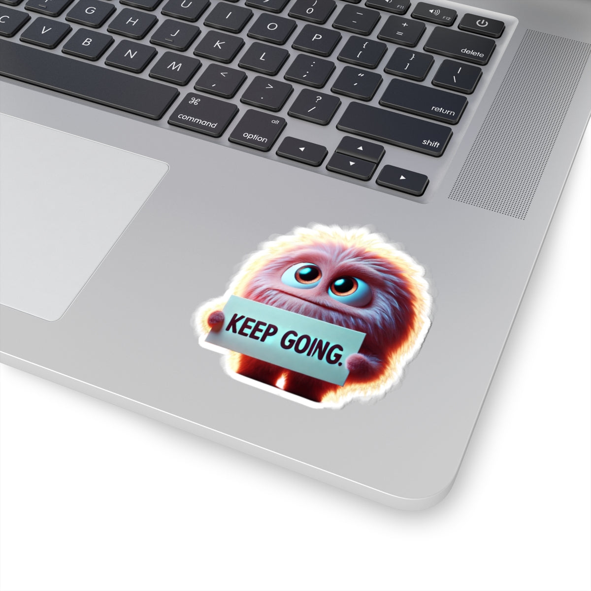 Round Fuzzy Pink Monster with ‘Keep Going’ Sign | The Monster Library
